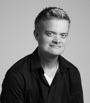 A black and white photo of Evan Minton wearing a black shirt